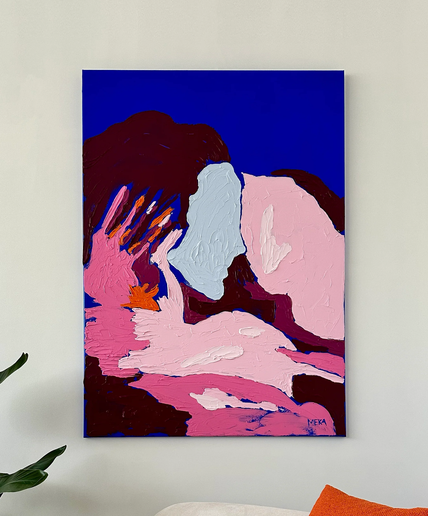Modern figurative abstract artwork by Art Of Meka with sculptural acrylic texture, bold blue background and soft pink contrasts, displayed in a contemporary interior.