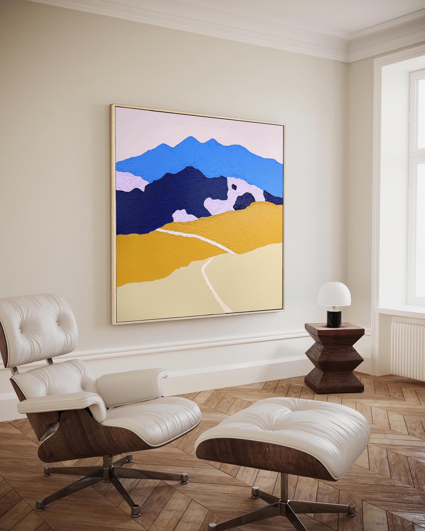 Textured abstract mountain painting by Art of Meka displayed in a modern interior, thick-paint acrylic artwork in blue and beige color palette